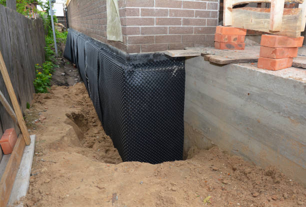 SJ Waterproofing Pros technician performing targeted Crawl Space Encapsulation assessment in Bridgeport, AL